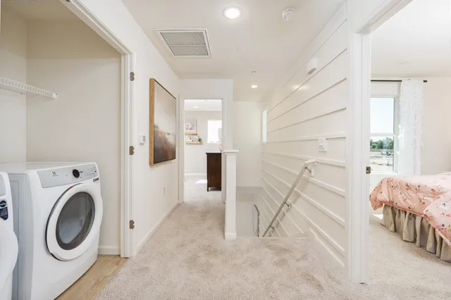 a view of washer and dryer in a utility room