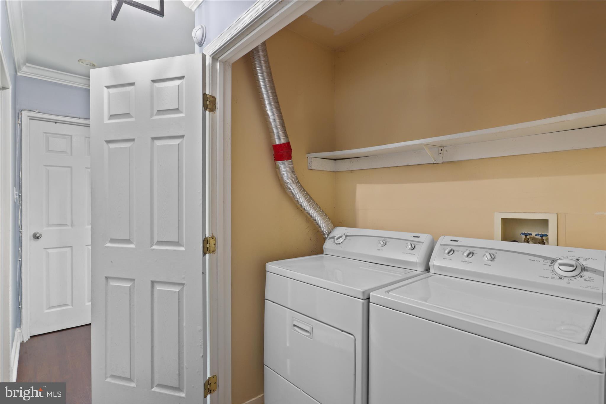 7750 Normandy Road Landover, MD 20785 - Photo 19 of 27 a utility room with dryer and washer