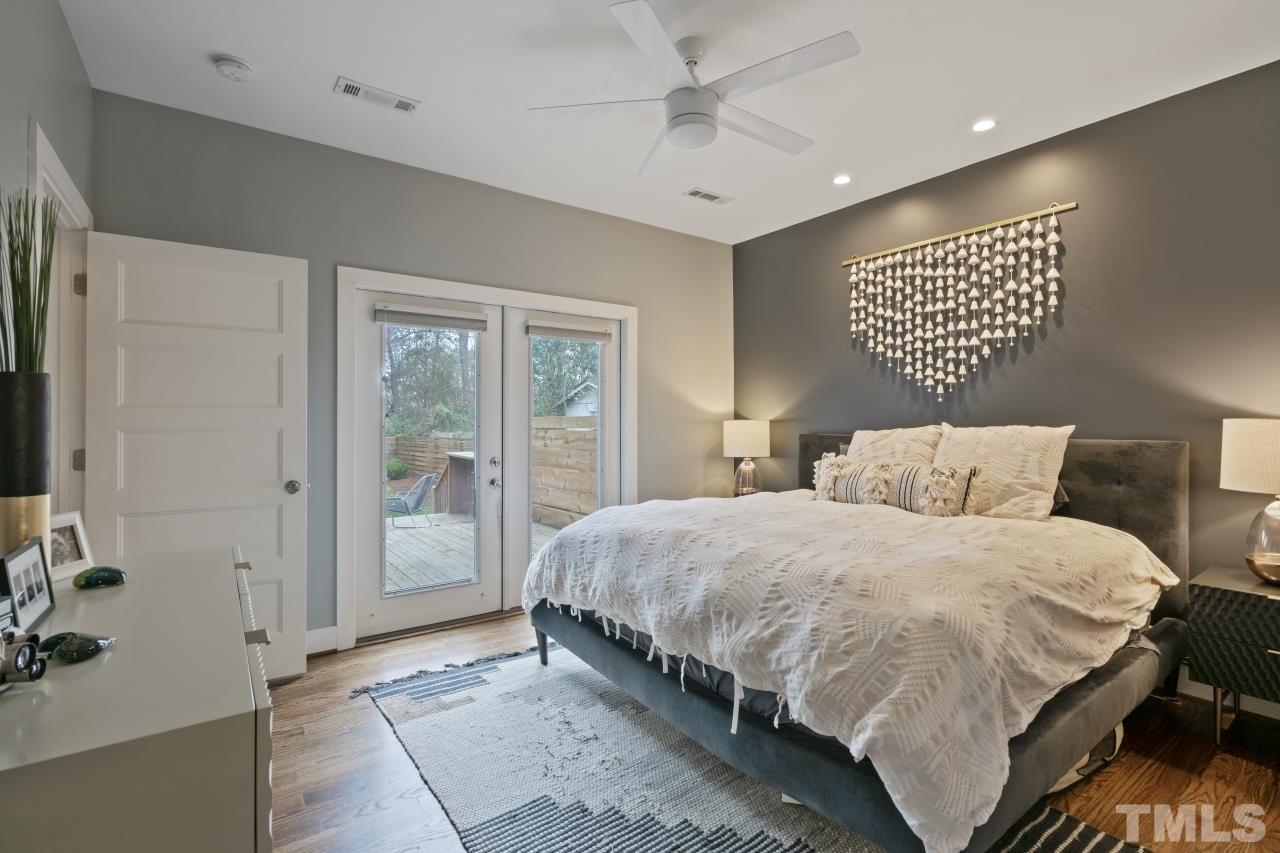 701 Colleton Road Raleigh, NC 27610 - Photo 20 of 39 a bedroom with a bed and a window