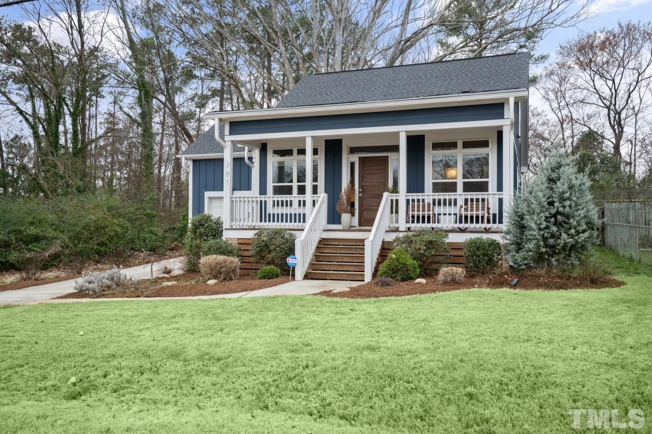 701 Colleton Road Raleigh, NC 27610 - Photo 2 of 39 front view of a house with a yard