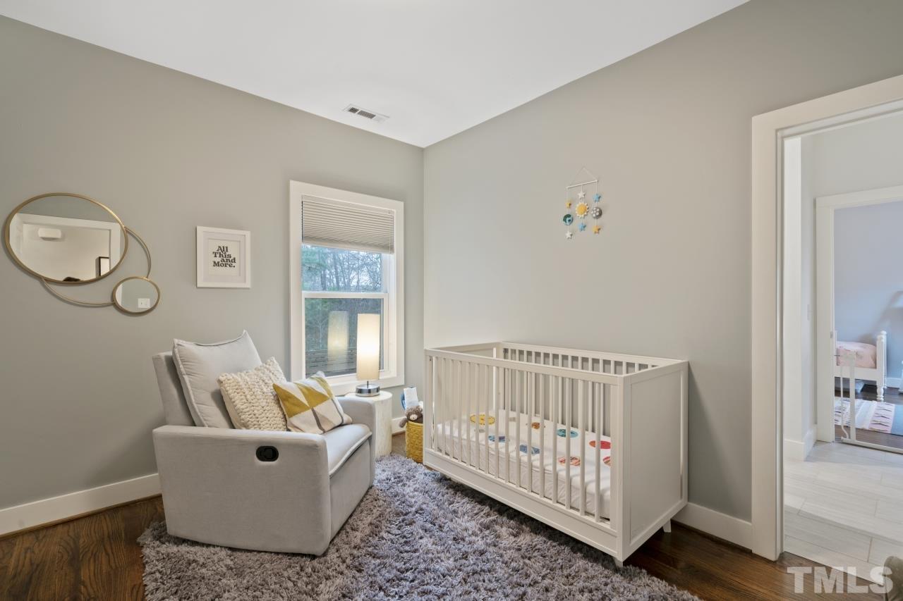 701 Colleton Road Raleigh, NC 27610 - Photo 27 of 39 a living room with furniture and a window