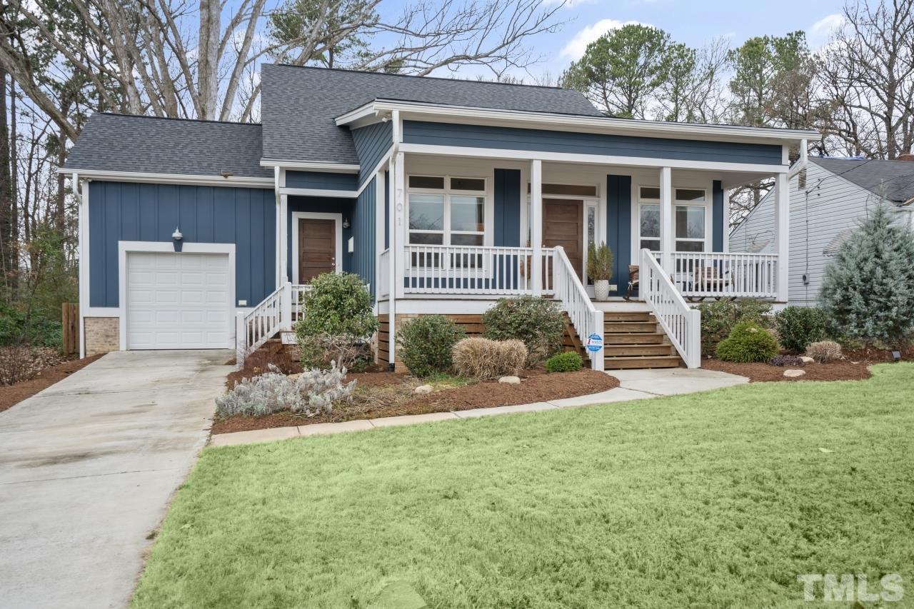 701 Colleton Road Raleigh, NC 27610 - Photo 3 of 39 a view of a house with backyard and porch