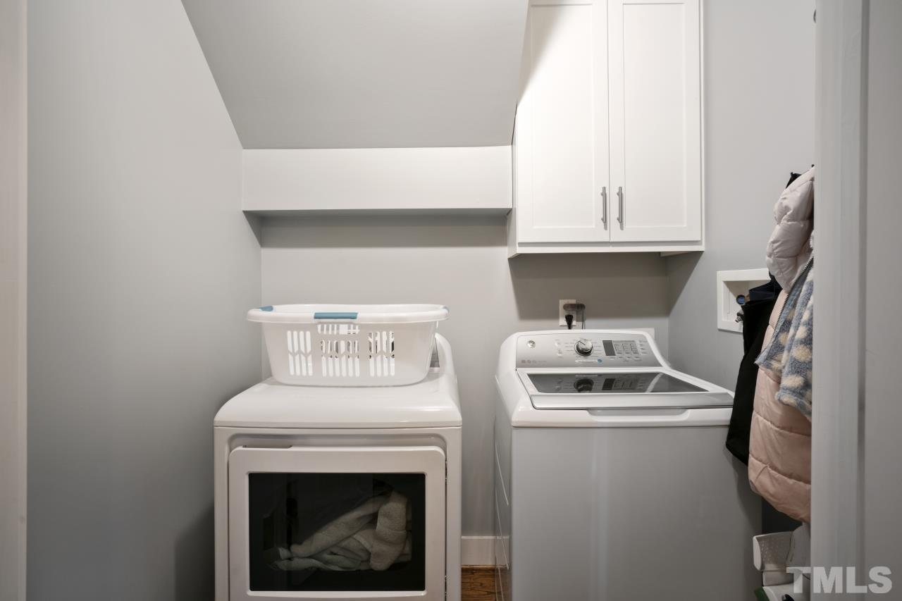701 Colleton Road Raleigh, NC 27610 - Photo 33 of 39 a utility room with dryer and washer
