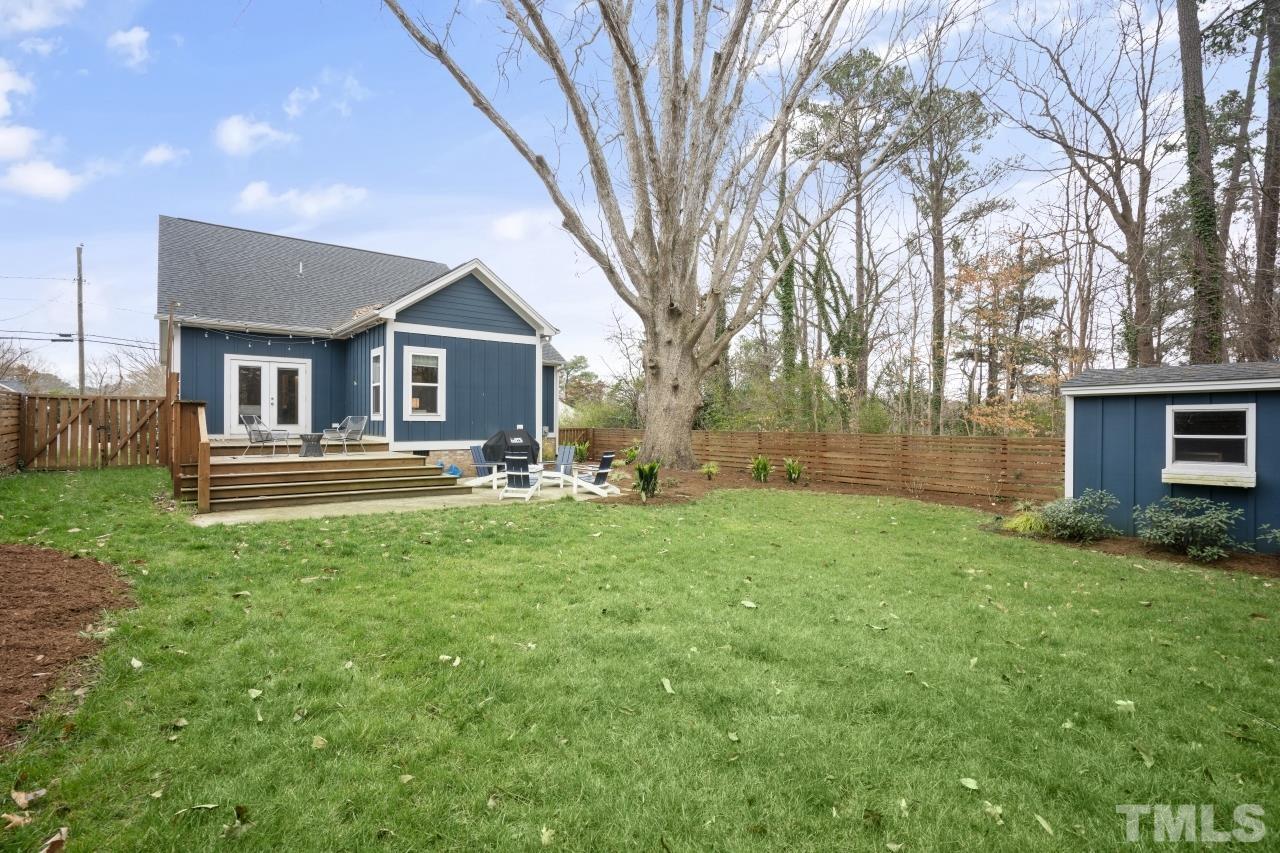 701 Colleton Road Raleigh, NC 27610 - Photo 35 of 39 a front view of house with yard and trees