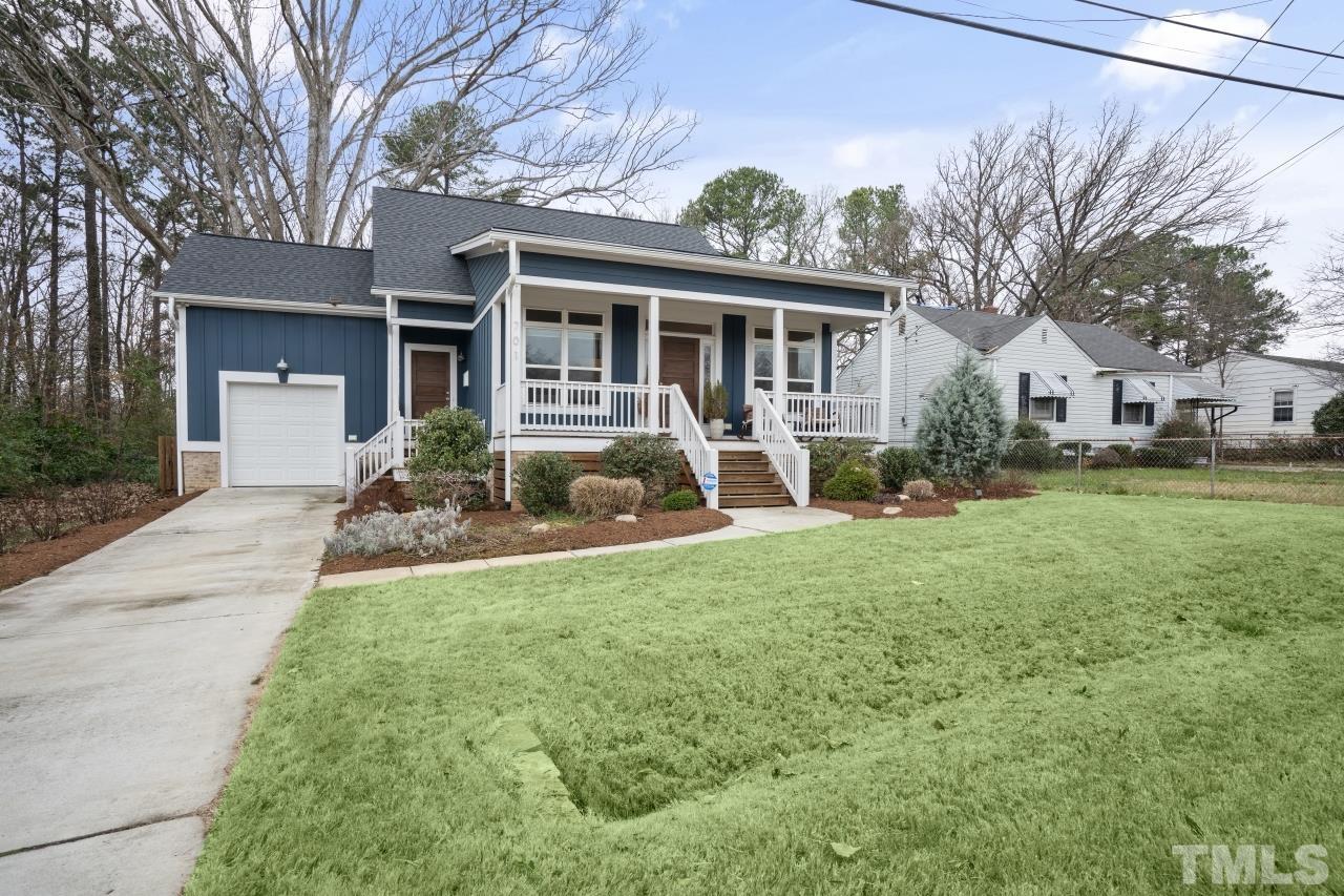 701 Colleton Road Raleigh, NC 27610 - Photo 4 of 39 a front view of house with yard patio and green space