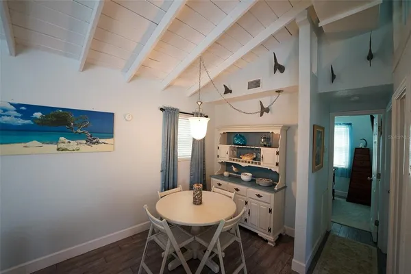 a view of a dining room with furniture