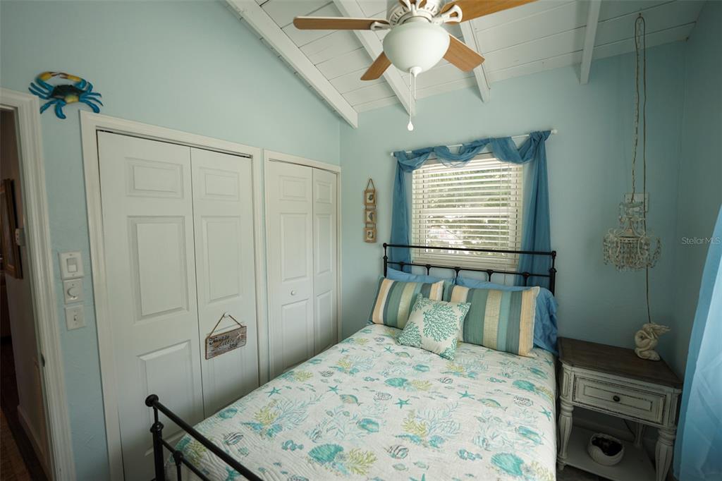 3480 Harbor Drive Weeki Wachee, FL 34607 - Photo 18 of 31 a bedroom with a bed and a window