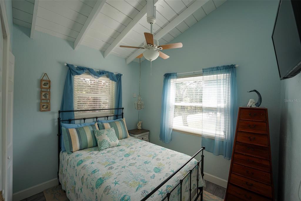 3480 Harbor Drive Weeki Wachee, FL 34607 - Photo 19 of 31 a bedroom with a bed and a window
