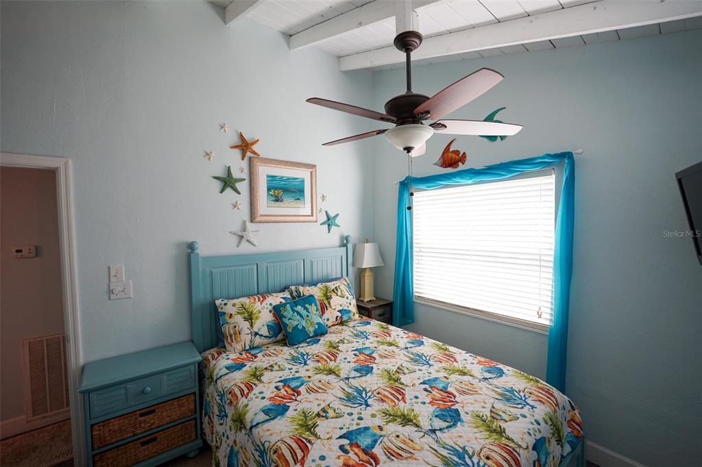 3480 Harbor Drive Weeki Wachee, FL 34607 - Photo 21 of 31 a bedroom with a bed and a window