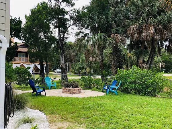 a view of a garden with a fountain