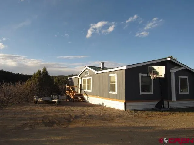 a view of a house with a park