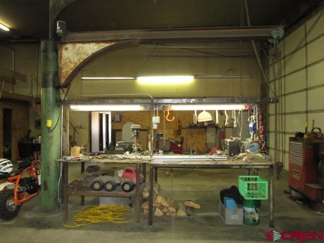 a room with lots of table and chairs