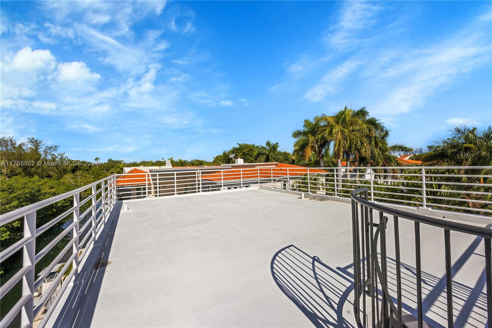 3566 Rockerman Road Miami, FL 33133 - Photo 21 of 43 a view of balcony with ocean view