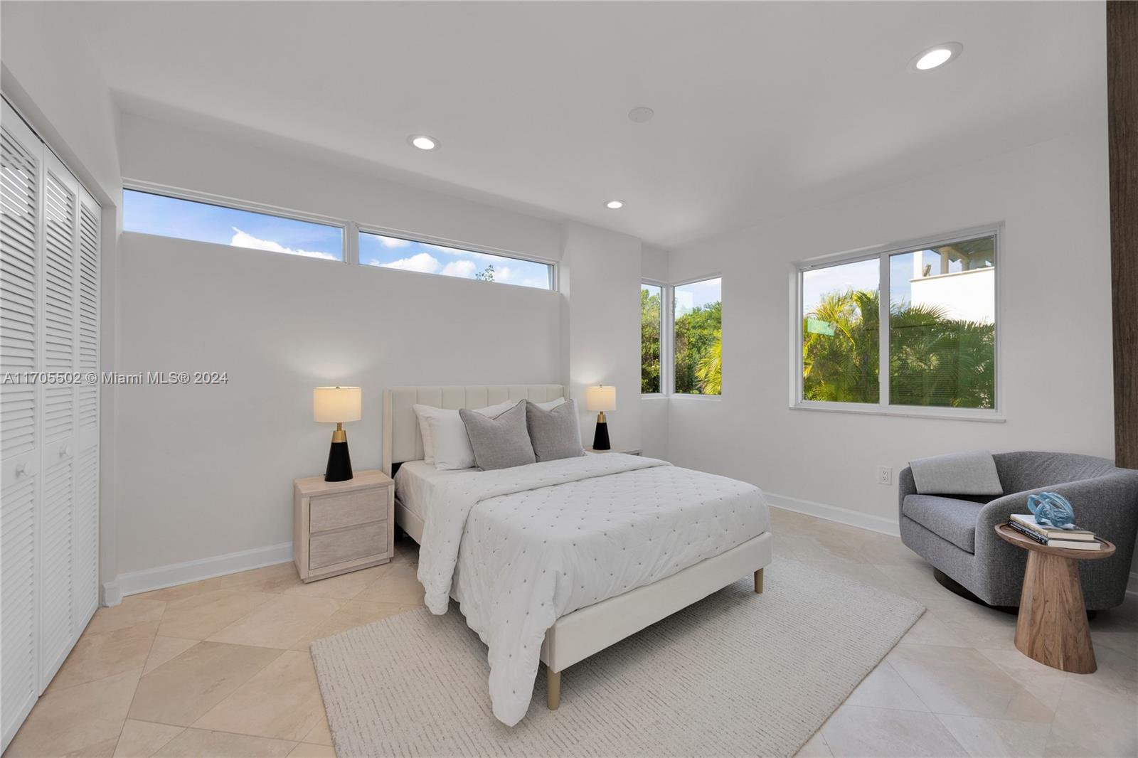 3566 Rockerman Road Miami, FL 33133 - Photo 22 of 43 a bedroom with a bed and window