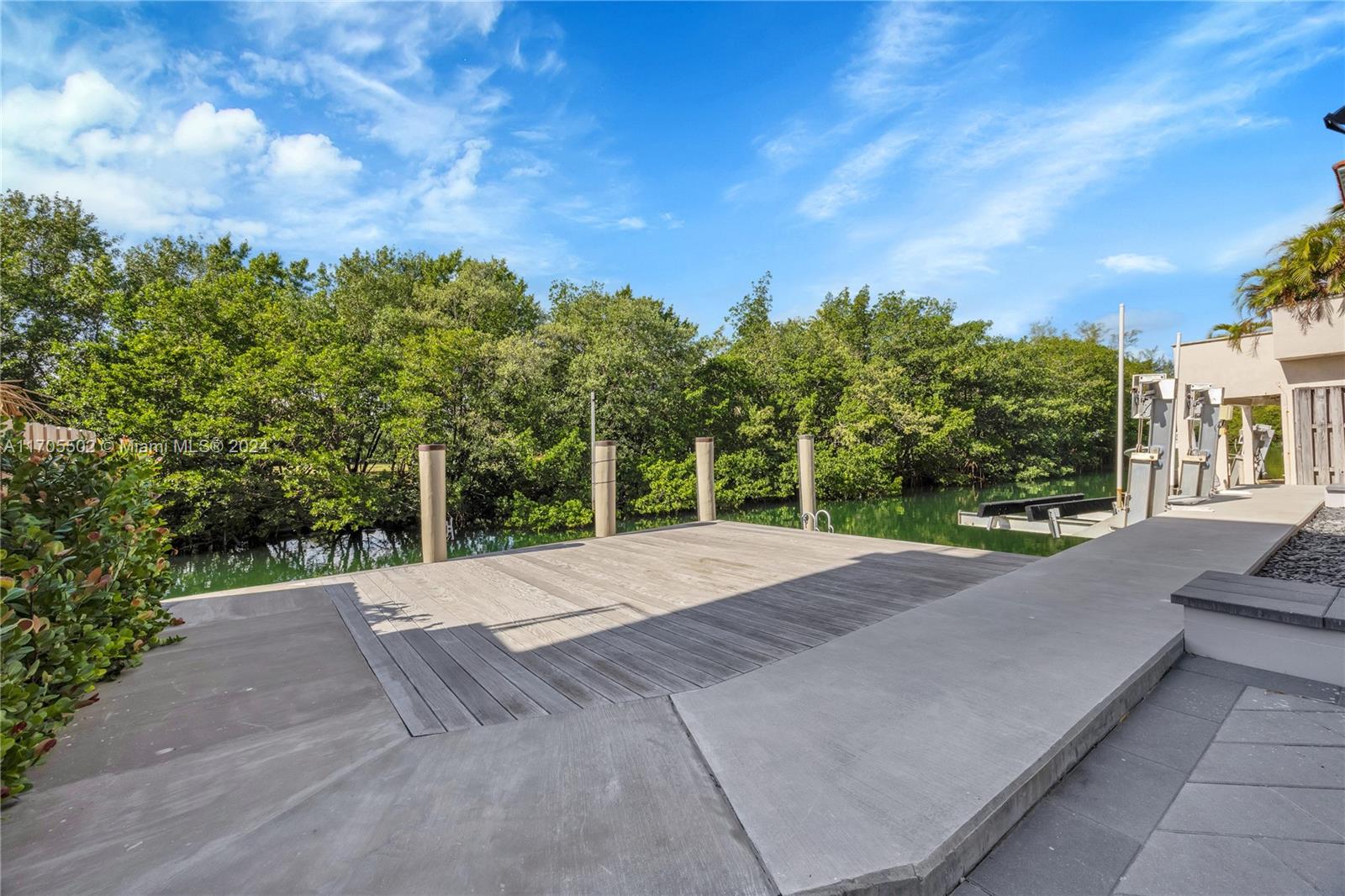 3566 Rockerman Road Miami, FL 33133 - Photo 33 of 43 a view of a road with a yard