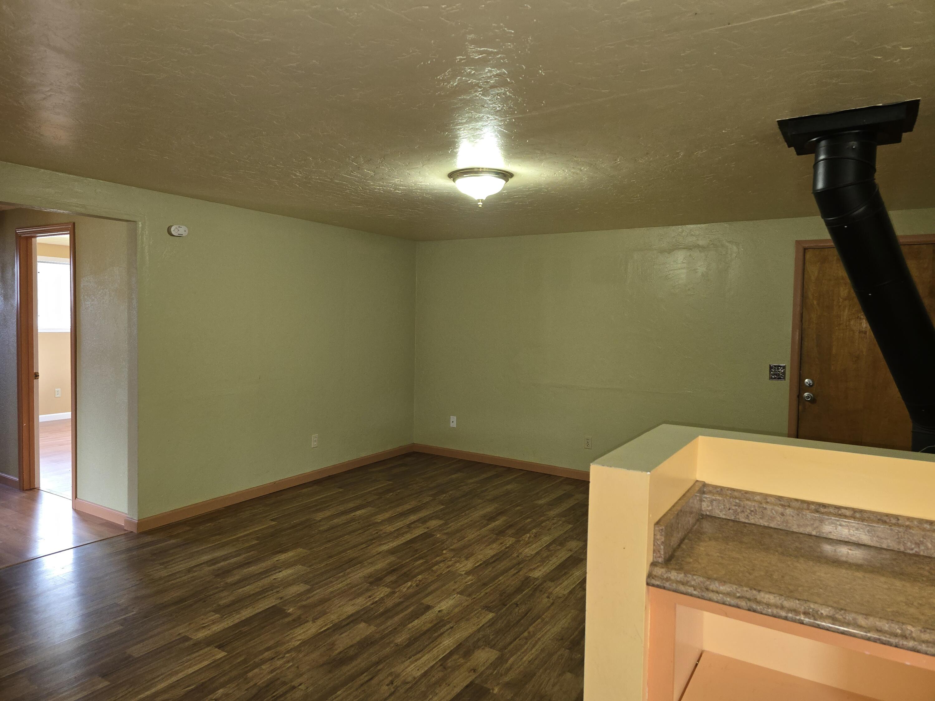 12750 Highway 3 Hayfork, CA 96041 - Photo 8 of 22 a view of hallway with wooden floor