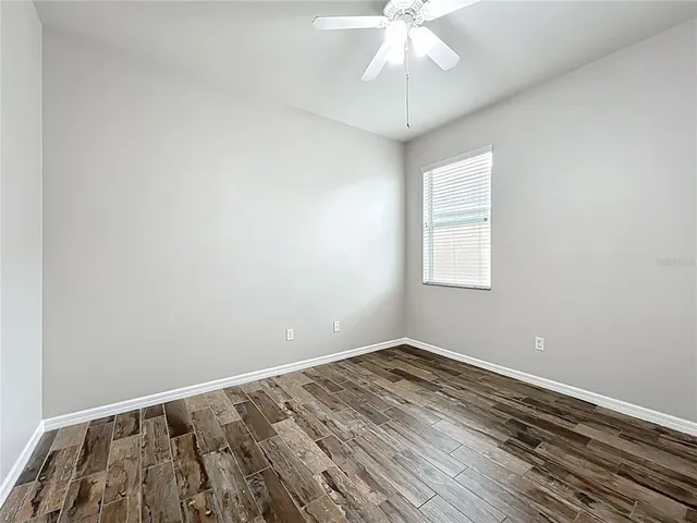 a house with garden in front of it