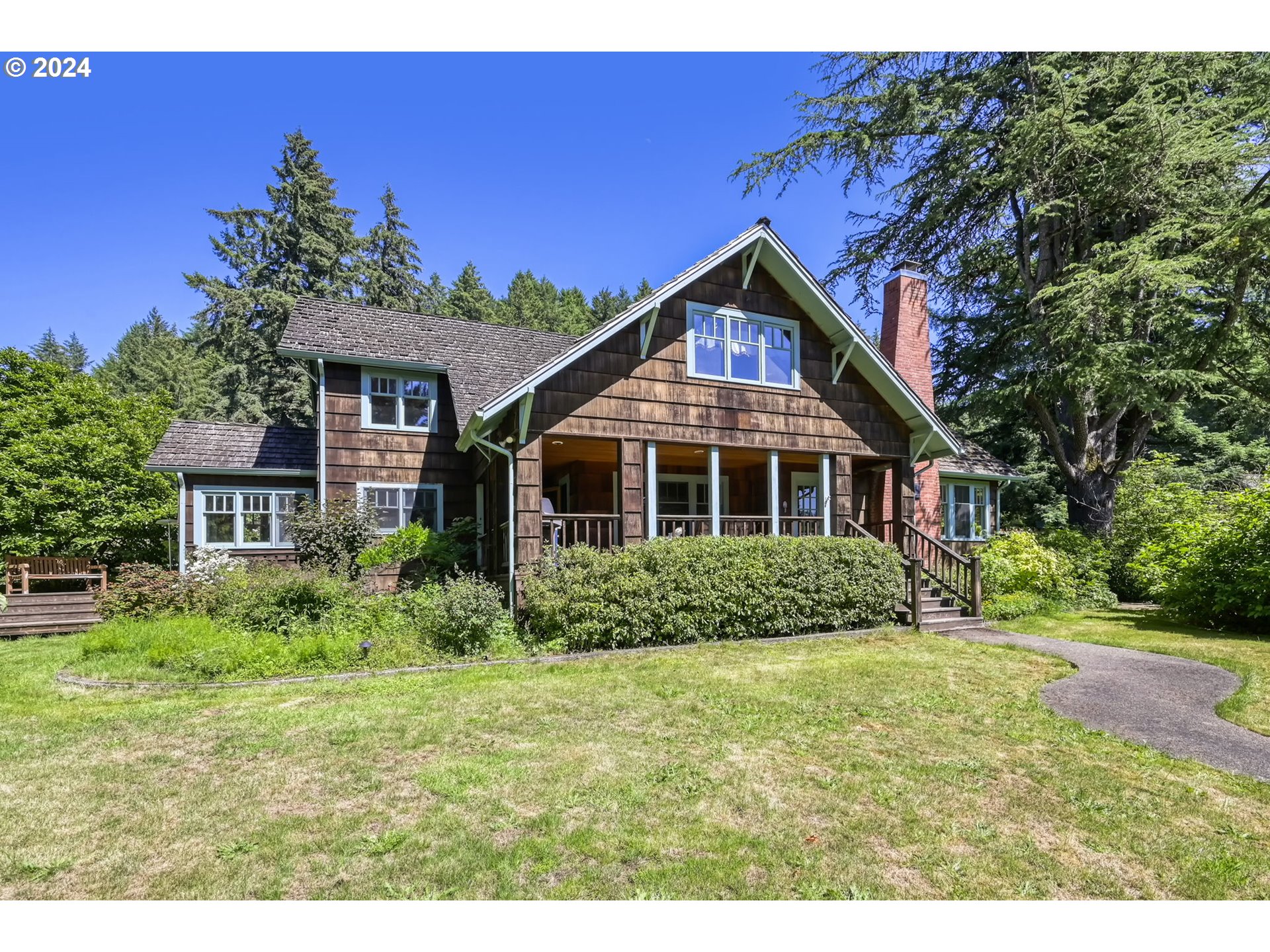 36245 Wagner Lane Cottage Grove, OR 97424 - Photo 2 of 45 a front view of a house with a yard
