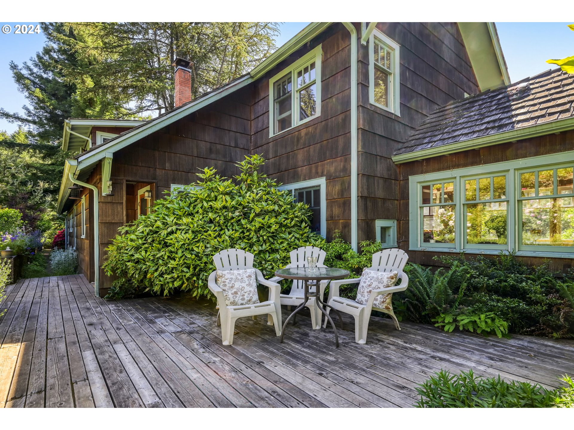 36245 Wagner Lane Cottage Grove, OR 97424 - Photo 27 of 45 a view of outdoor sitting area with furniture and wooden floor