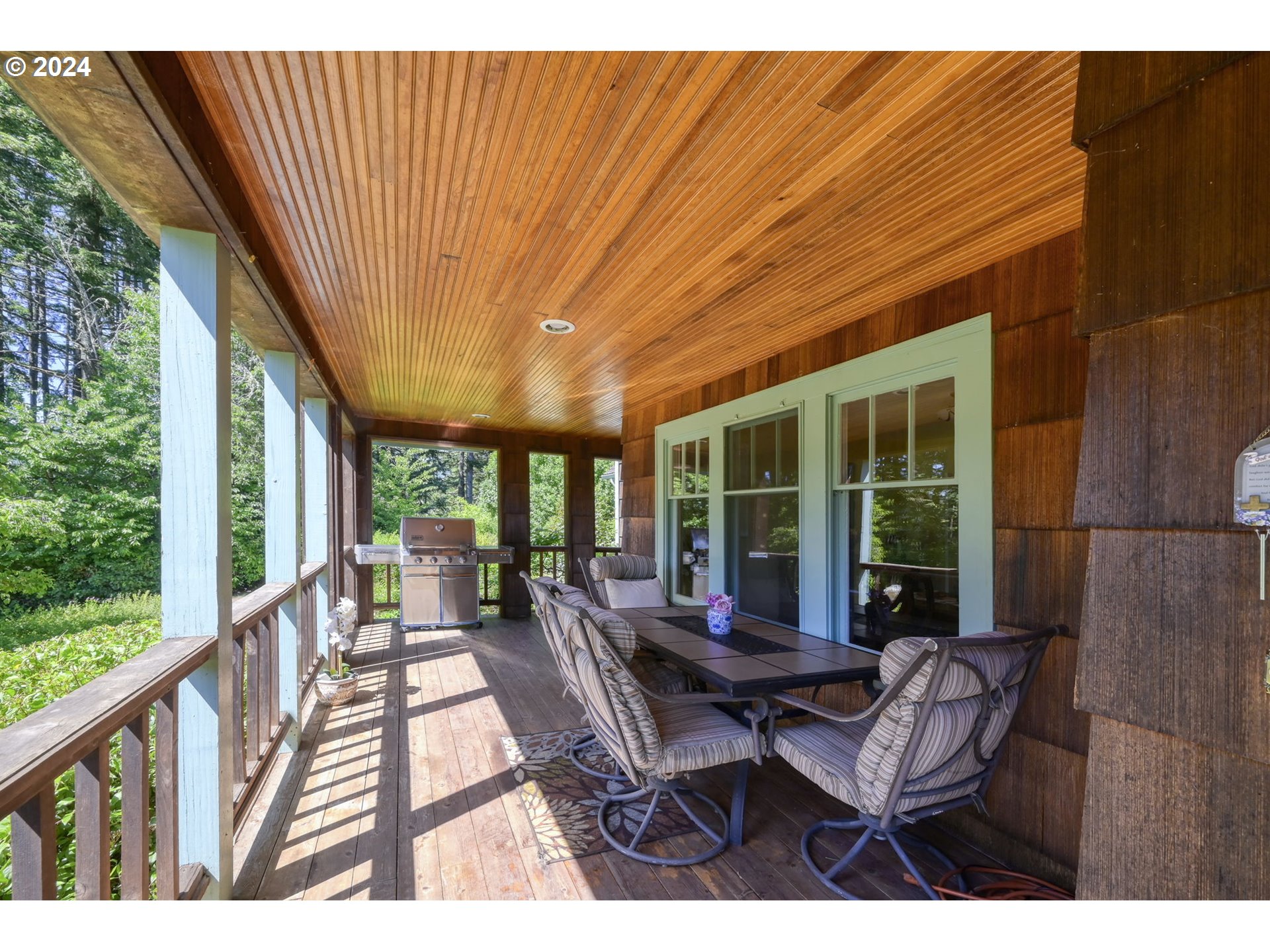 36245 Wagner Lane Cottage Grove, OR 97424 - Photo 6 of 45 a view of a patio with a table chairs and a patio