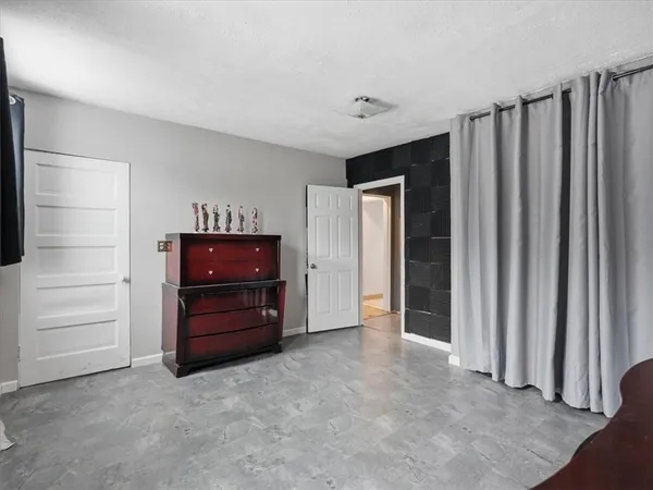 wooden floor and closet in a room