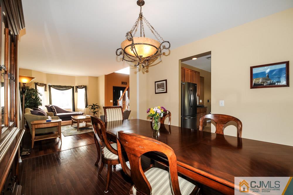 19 Cannon Road Old Bridge, NJ 08857 - Photo 8 of 22 a view of a dining room with furniture window and wooden floor