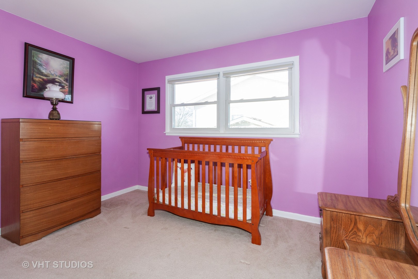 1210 Hemlock Lane Mount Prospect, IL 60056 - Photo 12 of 27 a bedroom with a baby bed and a window