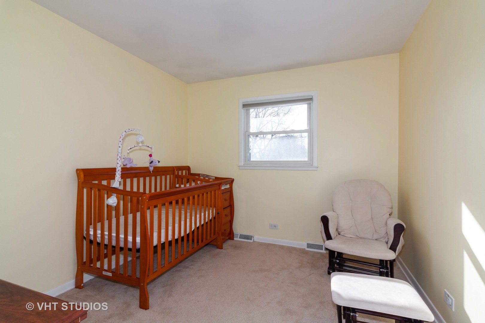 1210 Hemlock Lane Mount Prospect, IL 60056 - Photo 13 of 27 a bedroom with a bed and a window