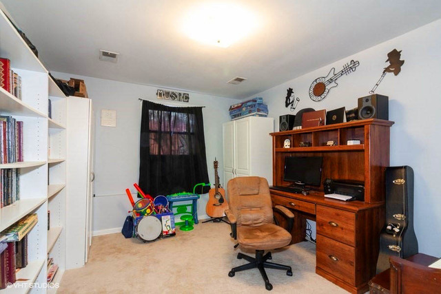 1210 Hemlock Lane Mount Prospect, IL 60056 - Photo 16 of 27 a view of a workspace with furniture