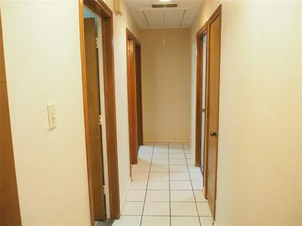 a view of hallway with shower