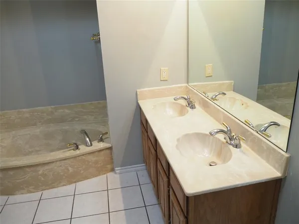a bathroom with a sink and a bathtub