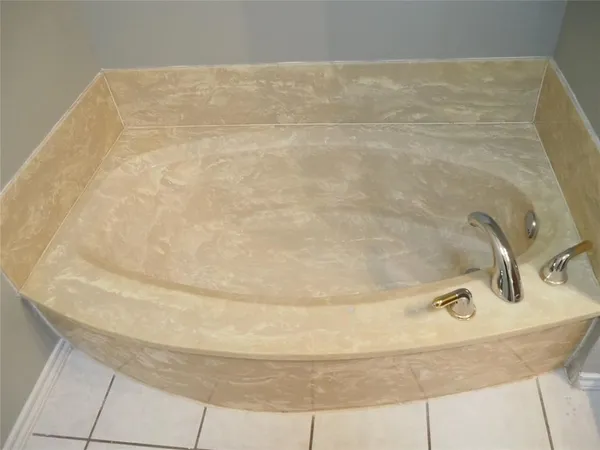 a bathroom with a bathtub