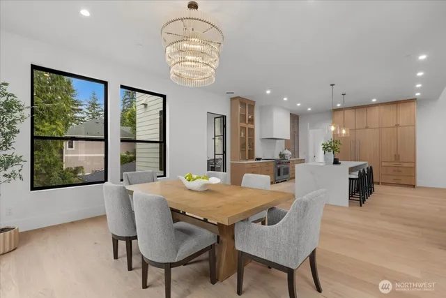 a view of a dining room with furniture window and outside view
