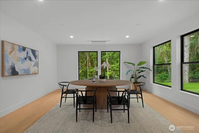 a view of a dining room with furniture window and outside view