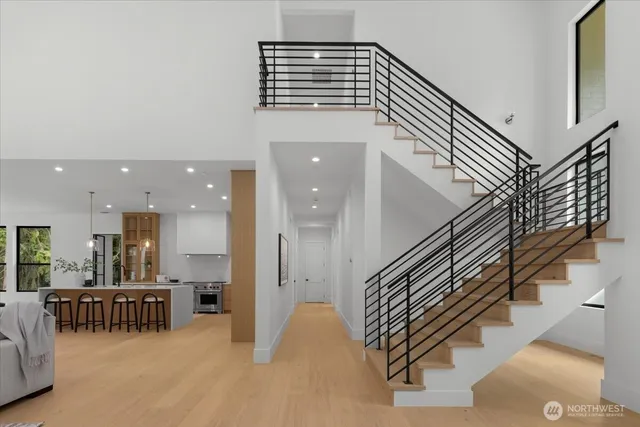 a view of a livingroom with furniture and stairs