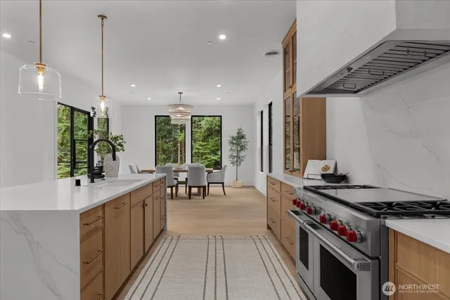a kitchen with a stove and a sink