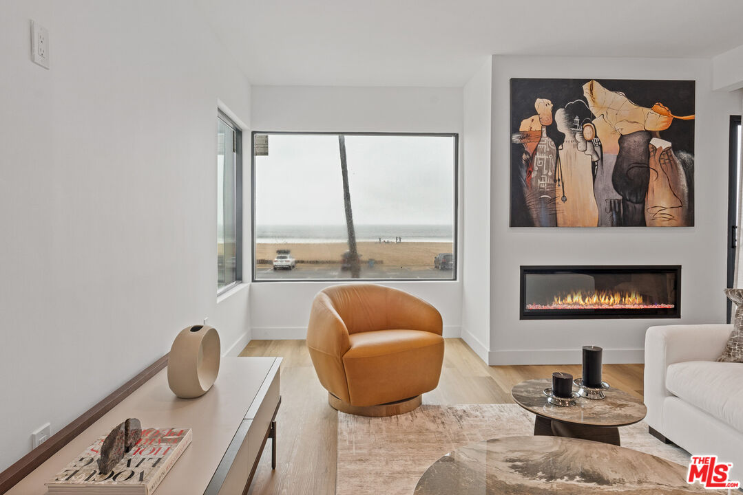 3305 Ocean Front Walk, Unit 1 & 2 Marina del Rey, CA 90292 - Photo 22 of 44 a bedroom with furniture and a window