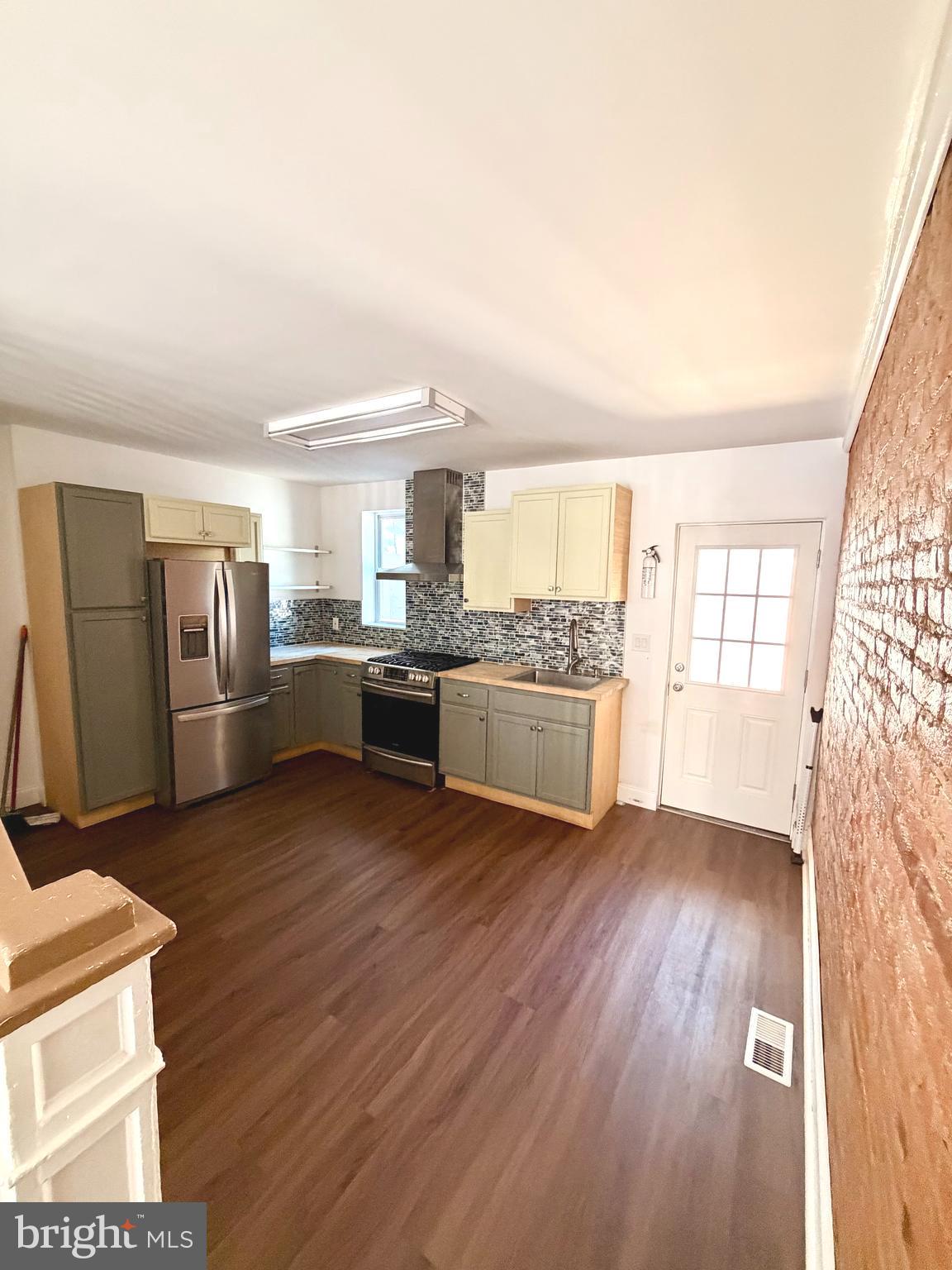 1944 Palethorp Street Philadelphia, PA 19122 - Photo 4 of 14 Modern with stainless appliances, spacious dining