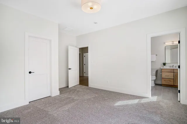 a view of a livingroom and a kitchen