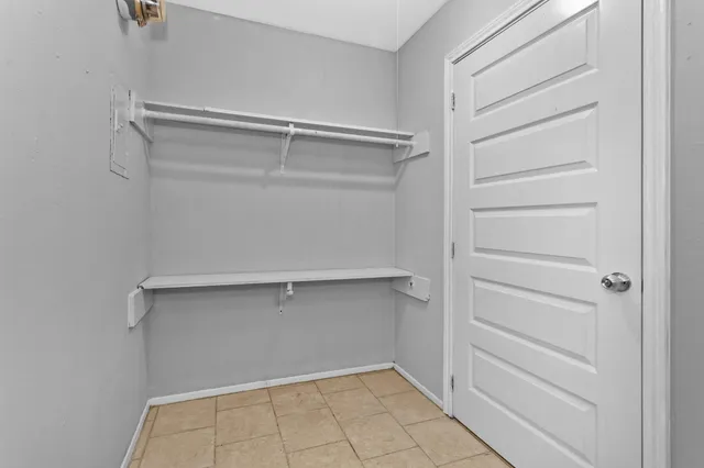 a view of a street with a building in the background