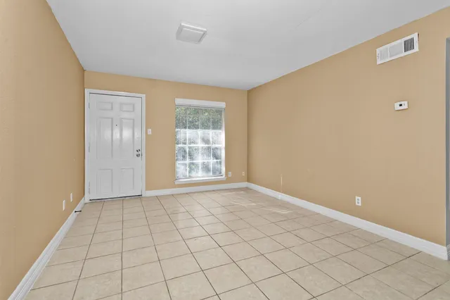 a view of an empty room with window