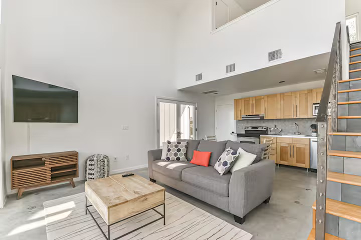 620 Windy Hills Road Dripping Springs, TX 78620 - Photo 17 of 30 Home 2 - Living room featuring concrete floors and a high ceilings.