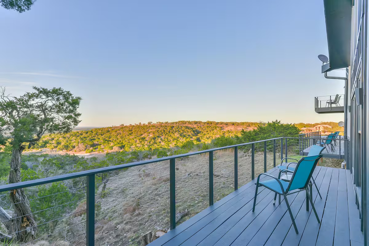 620 Windy Hills Road Dripping Springs, TX 78620 - Photo 25 of 30 View of balcony at dusk