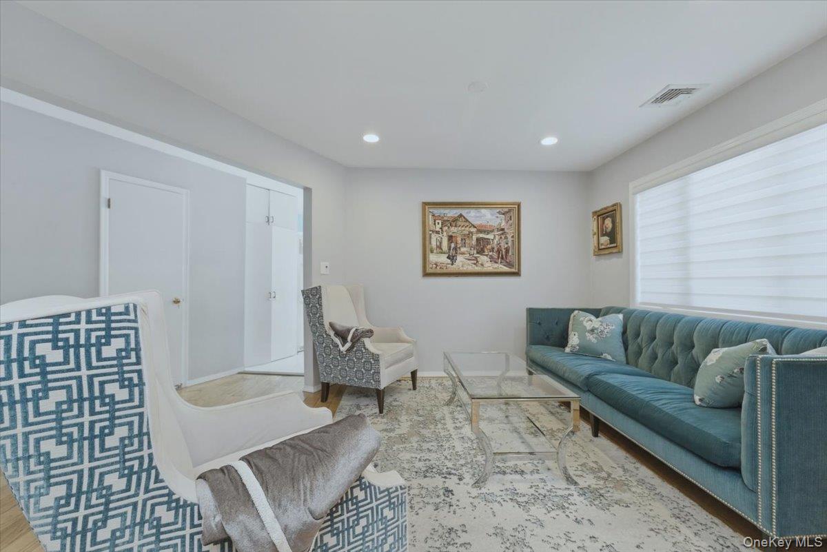 151 Wanser Avenue Inwood, NY 11096 - Photo 5 of 19 a living room with furniture and a couch