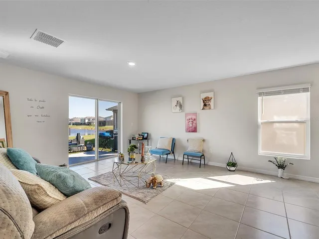 a living room with furniture and a table