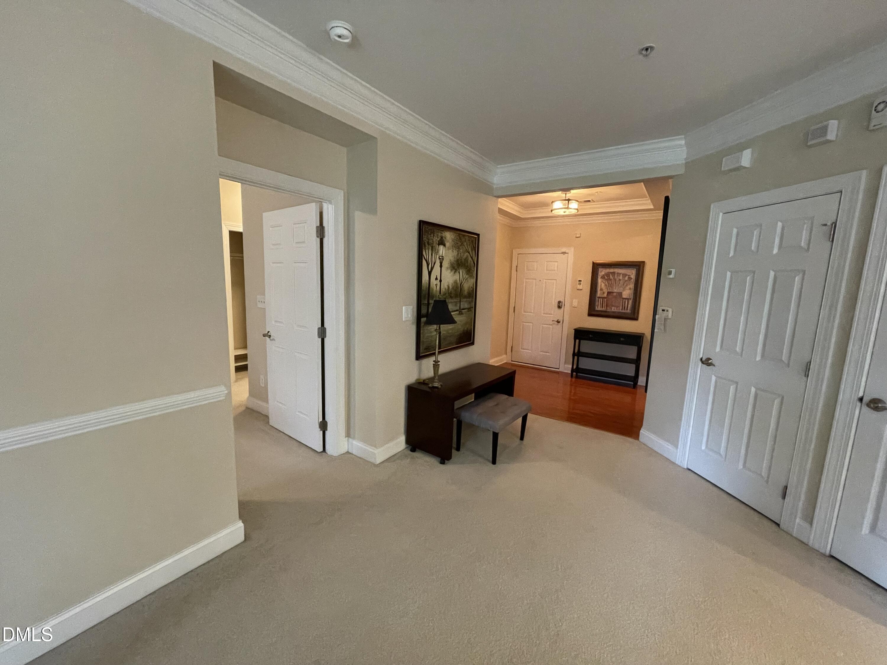 10411 Rosegate Court, Unit 3 Raleigh, NC 27617 - Photo 24 of 62 a living room with furniture and a window