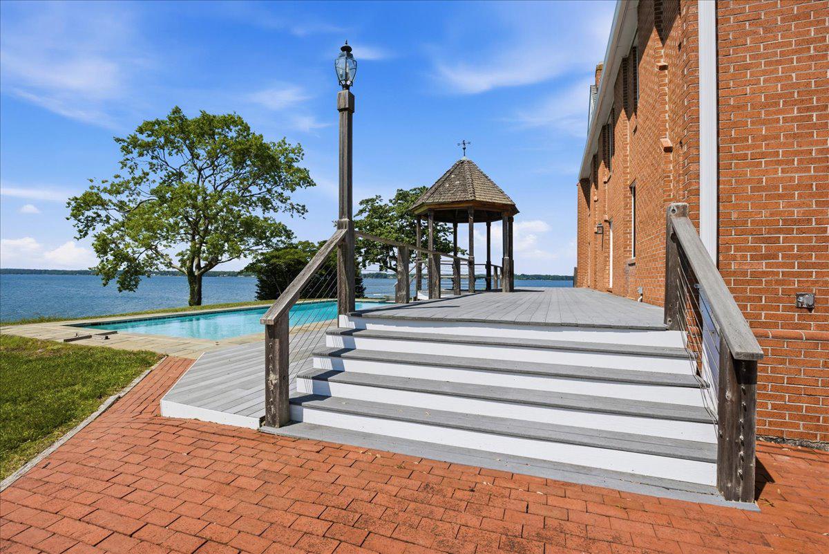 2070 Turner Road Lusby, MD 20657 - Photo 45 of 79 Enter the Trex deck with ipe and cable railings