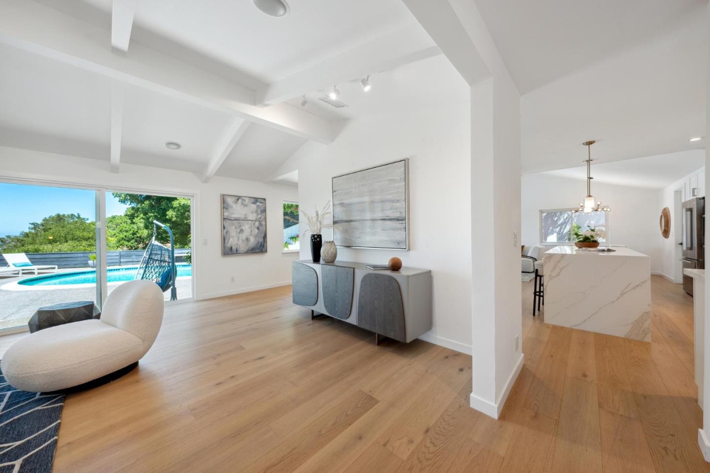2620 Summit Drive Burlingame, CA 94010 - Photo 12 of 84 a living room with furniture and a wooden floor