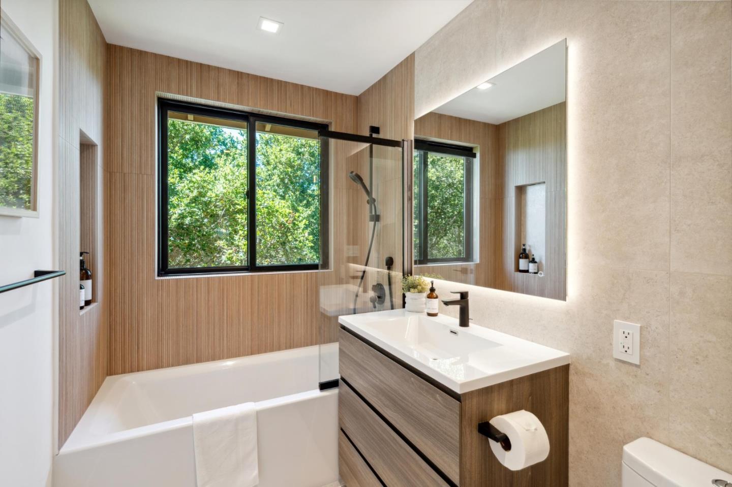 2620 Summit Drive Burlingame, CA 94010 - Photo 33 of 84 a bathroom with a sink and a bathtub