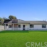 a large house with a garden